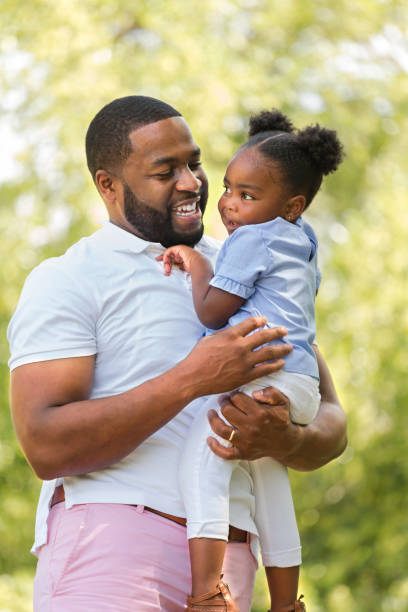 istock African American father and daughter. 1214388946