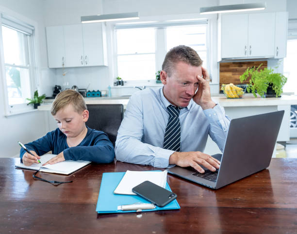 istock Coronavirus Outbreak schools and offices closing. Stressed parent trying to cope with remote work and homeschooling. COVID-19 pandemic forces shutdowns, quarantine, online learning and work from home. 1214388974