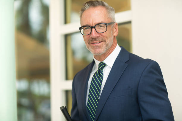 istock Handsome mature businessman at work 1214389799