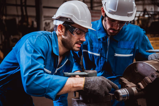 istock The Industry engineering wearing safety uniform control operating in industry factory. 1214390594