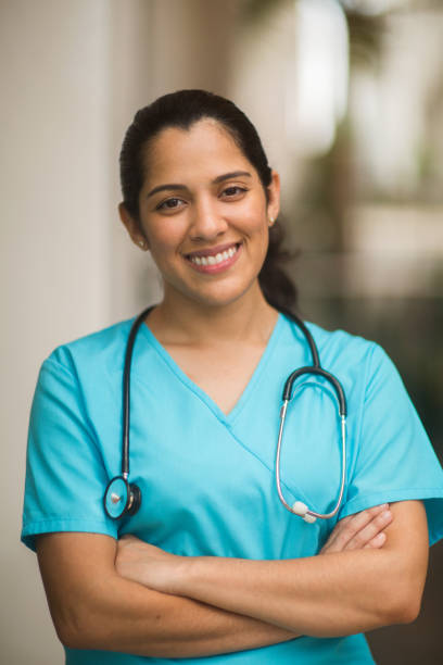 portrait of young adult female healthcare professional stock photo - portrait vertical close up female imagens e fotografias de stock