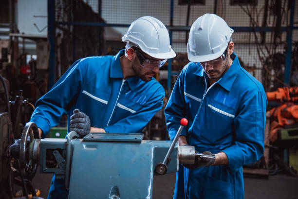 istock The Industry engineering wearing safety uniform used Vernier caliper to measure the object control working in industry factory. 1214391431