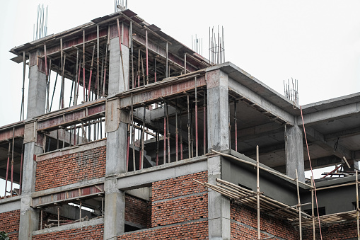 Building under construction. Details of exterior brick and cement walls- Buenos Aires - Argentina