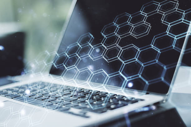 istock Creative concept of wireless technology with hexagon hologram on modern laptop background. Big data and database concept. Multiexposure 1214397713