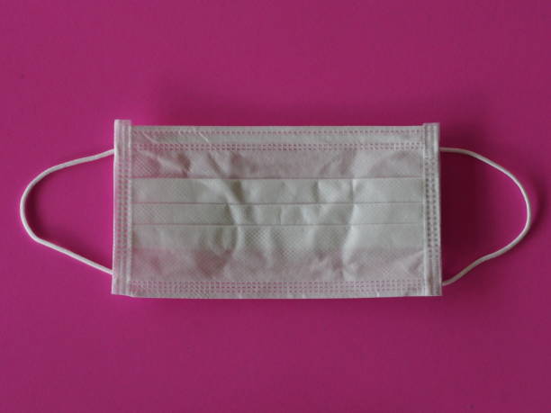 istock resparator mask self prevention ill on pink background for dust and germs pm 2.5, virus covid 19 1214399950