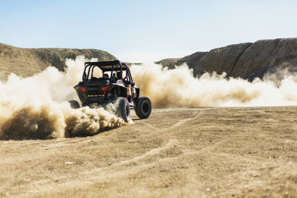 Men and Boys Outdoor Activities Off-road Fun in Western Colorado Desert stock photo