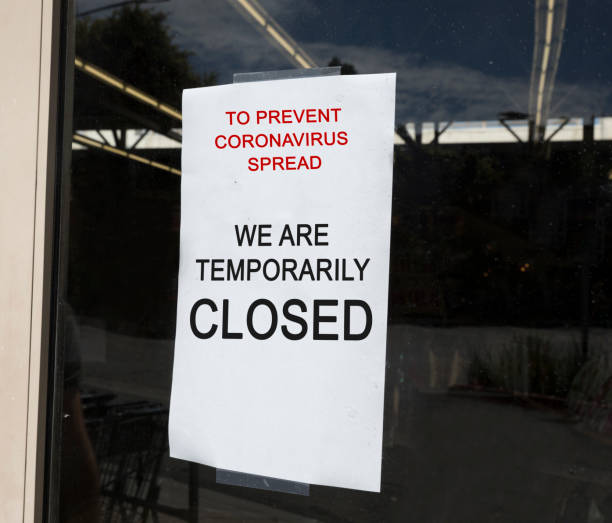 istock Store Temporarily Closed sign 1214404390
