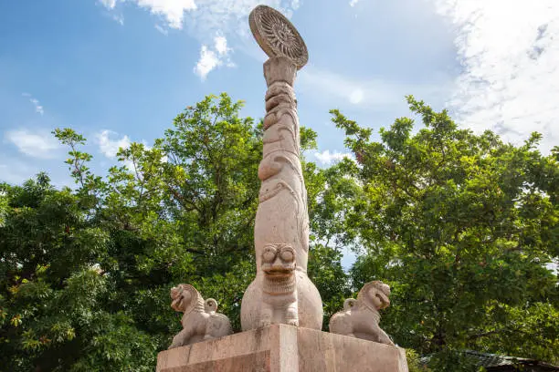 Photo of The Pillars of Ashoka before entering  the Mahamewna gardens the sacred place of Jaya Sri Maha Bodhi in Anuradhapura, Sri Lanka.