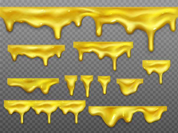 istock Realistic set of dripping gold liquid honey 1214410490