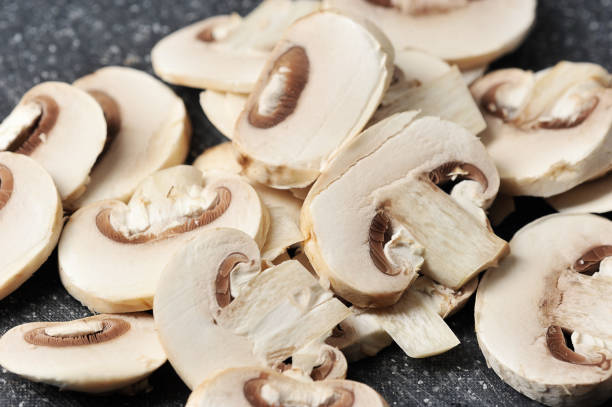 istock fresh mushrooms cut into pieces 1214412264