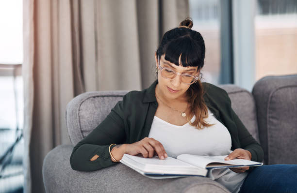 istock I can't get enough of this book 1214413719