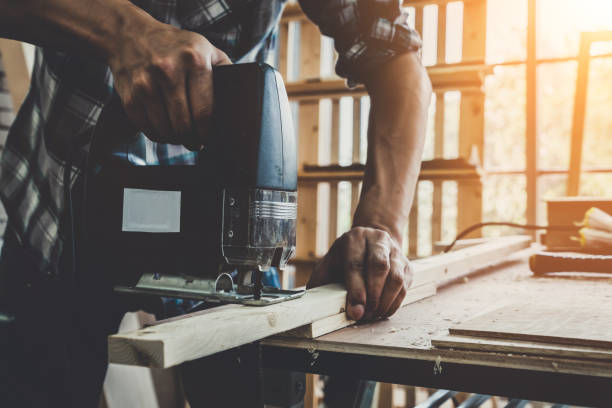 istock Carpenter working on wood craft at workshop 1214416135