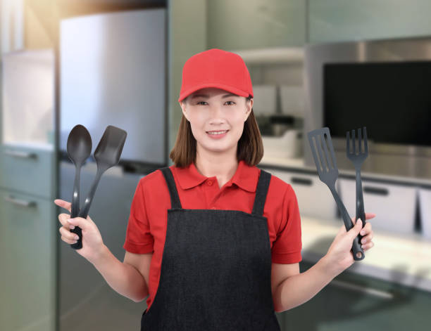 istock Female Chef assistant or housewife 1214416319