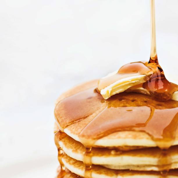 layers Pancakes with Honey Syrup layers Pancakes with Honey Syrup pancake stock pictures, royalty-free photos & images