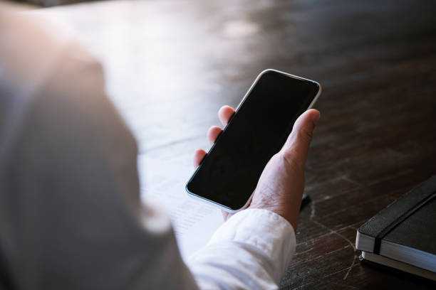 istock Business man hand hold smart phone. technology concept 1214418532