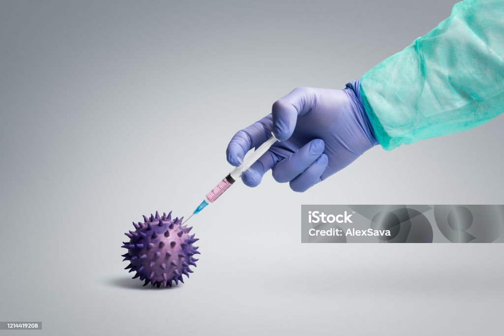 Vaccine Health worker  injecting vaccine into a pathogen like viruses and bacteria Vaccination Stock Photo