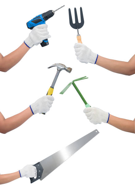●白に隔離された職人用具を持つ女性労働者手の手袋を着用するコレクションセット - hand drill hand tool screwdriver drill ストックフォトと画像
