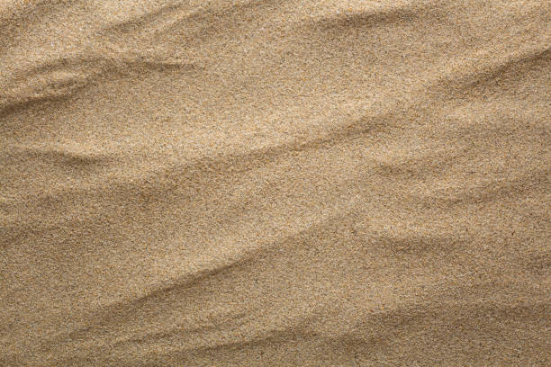 istock The sand background. Flat lay top view. 1214422187