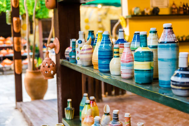 istock Beautiful handmade pottery bottles and cups. Art/ craftmanship concept. 1214426594