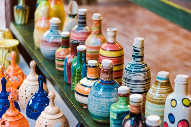 istock Beautiful handmade pottery bottles and cups. Art/ craftmanship concept. 1214426617