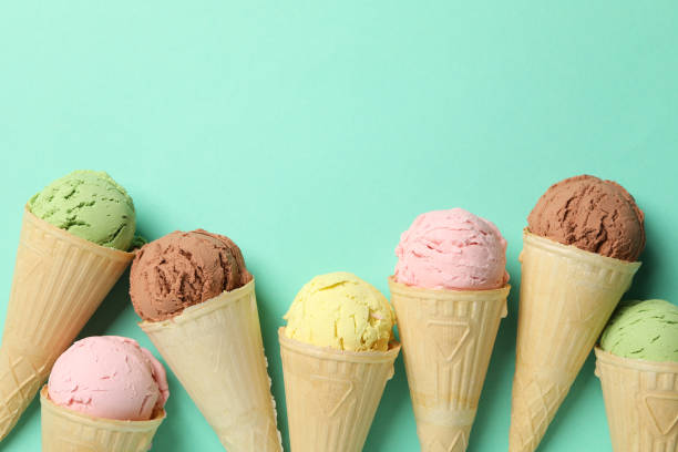 istock Ice cream in waffles on mint background. Sweet food 1214428044