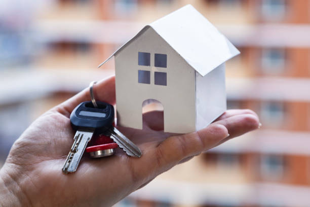 istock House and keys in hand 1214428074
