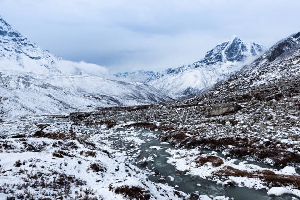 istock Chukhung valley on Everest Base Camp trek at snowy day. 1214428102