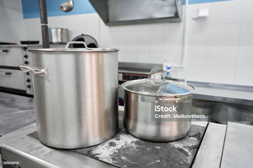 https://media.istockphoto.com/id/1214429134/photo/closeup-of-large-pots-on-the-stove-chef-cooking-at-commercial-kitchen-hot-job-real-dirty.jpg?s=1024x1024&w=is&k=20&c=2sBxI2xhXUMw8JJ7ohAQYMZeCuIwWJy9XK_ZRp95Oys=