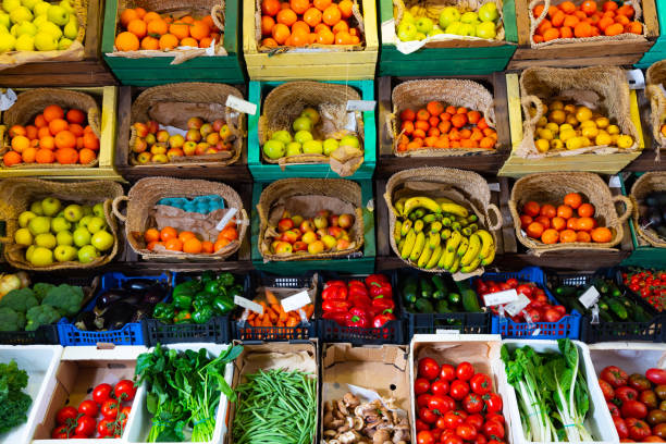 istock Fruits and vegetables in greengrocery 1214431811