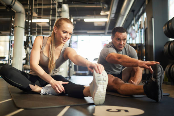 istock Personal Fitness Coach Working with Female Client 1214435390