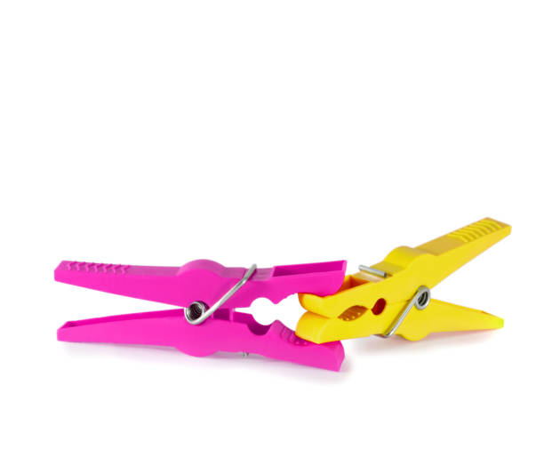 istock clothespins aggression virus clothes-peg isolated on white background 1214436996