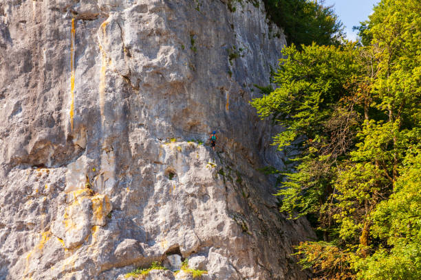 istock Rock climber ascending a challenging cliff in Bohinj 1214441882