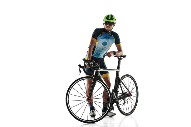 istock Triathlon male athlete cycle training isolated on white studio background 1214442120