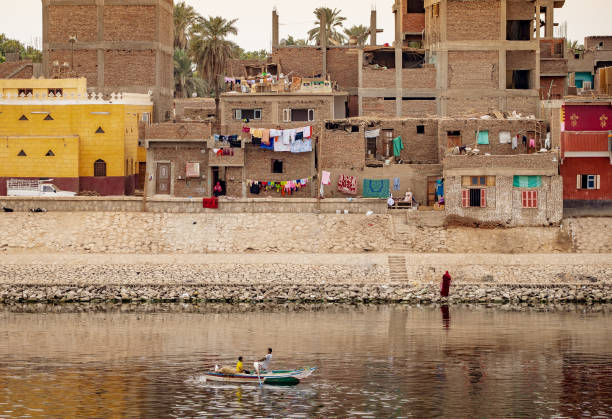 daily life on the bank of nile river in egypt. a small town near luxor - desert egyptian culture village town imagens e fotografias de stock