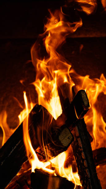 istock Fire in the soapstone oven 1214446329