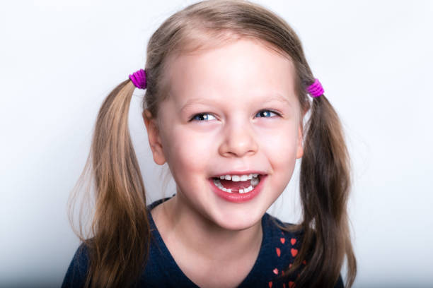 istock child dropped the first milk tooth 1214446602