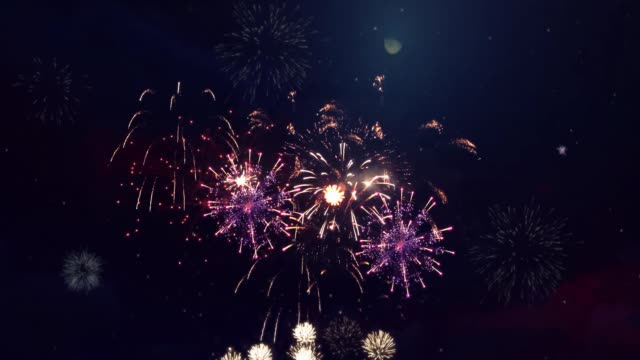 Abstract colored firework in night sky Loop Animation Background.