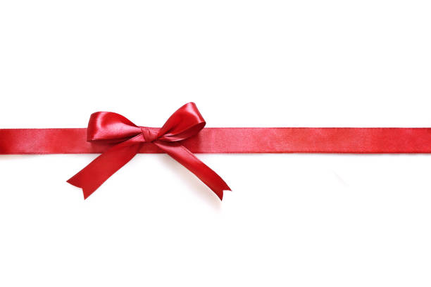 istock Shiny red satin ribbon with bow 1214448202