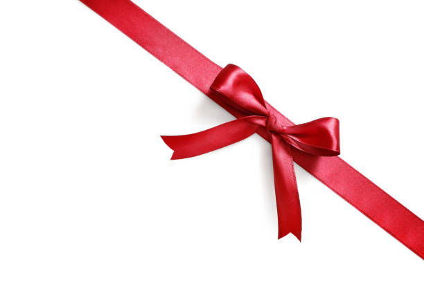 istock Shiny red satin ribbon with bow 1214448223