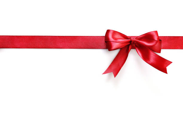 istock Shiny red satin ribbon with bow 1214448261
