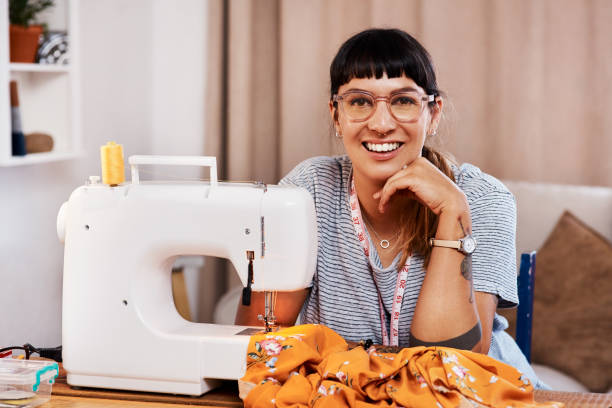 istock Using her sewing skills to make money from home 1214448721