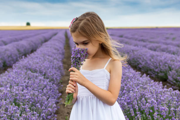 istock Girl in a lavender field 1214451861