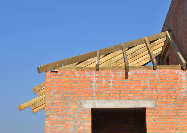 istock Roofing construction with wooden rafters, eaves and timber. 1214452559