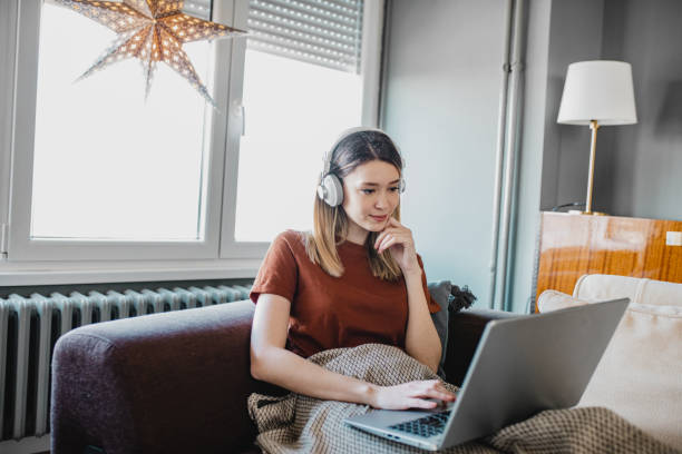 istock Young woman working from home 1214453875