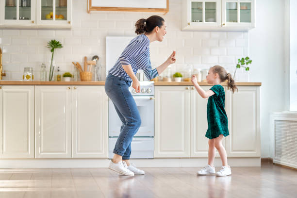 istock Happy family in the kitchen. 1214454030