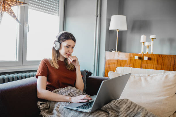 istock Young woman working from home 1214454058