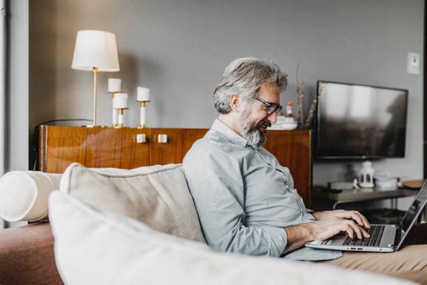 istock Mature man is working from home 1214454141