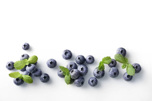 istock Fresh blueberries isolated on white background. Top view 1214454864