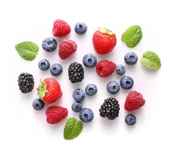 Fresh summer berries on white background. Top view