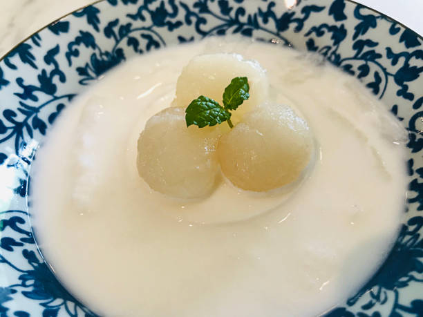 istock Young coconut pudding served with rambutan in Thailand. 1214455321